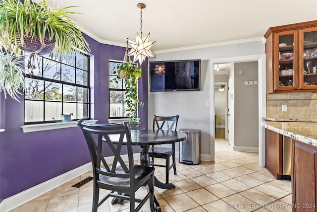 tiled dining area with ornamental molding