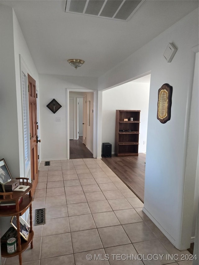 hall featuring light wood-type flooring