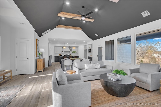 living area with visible vents, ceiling fan, recessed lighting, light wood-style flooring, and high vaulted ceiling