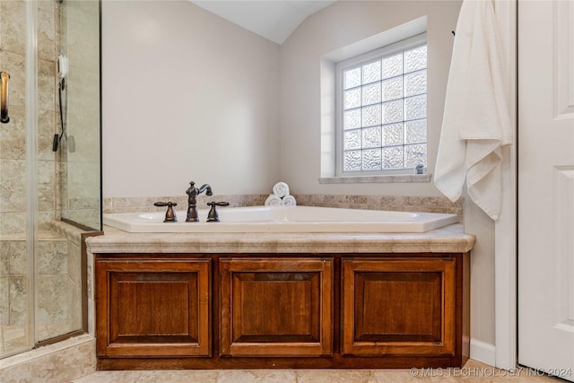 bathroom with plus walk in shower and lofted ceiling