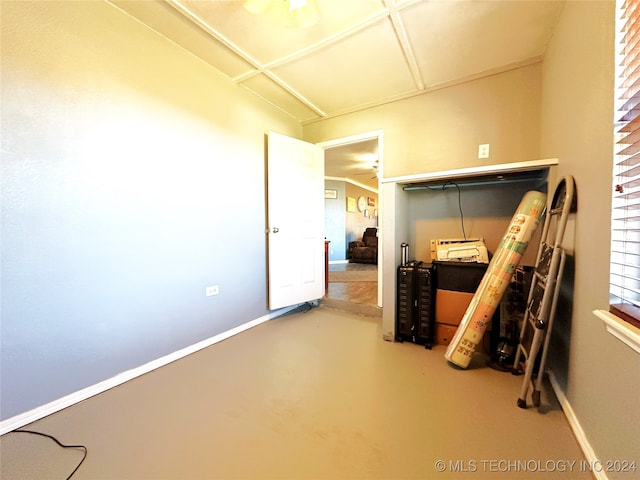 interior space with concrete floors and ceiling fan