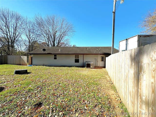 76 N Greer, Eufaula, OK 74432 - back of house featuring central air condition unit