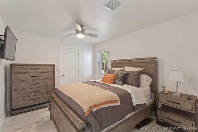 bedroom featuring ceiling fan