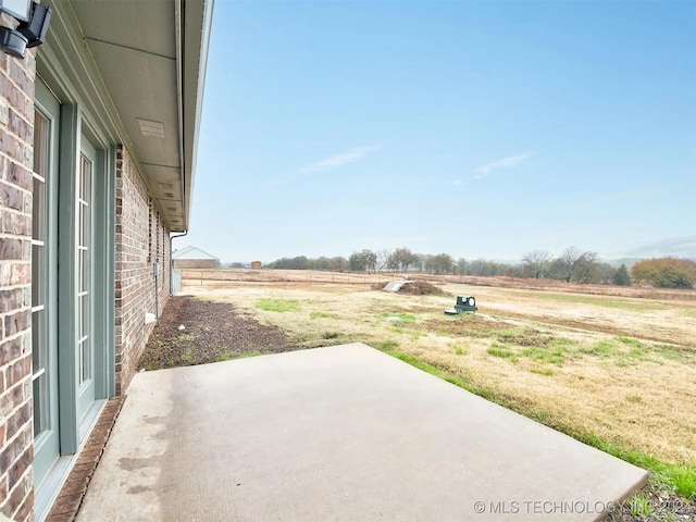 view of patio featuring a rural view