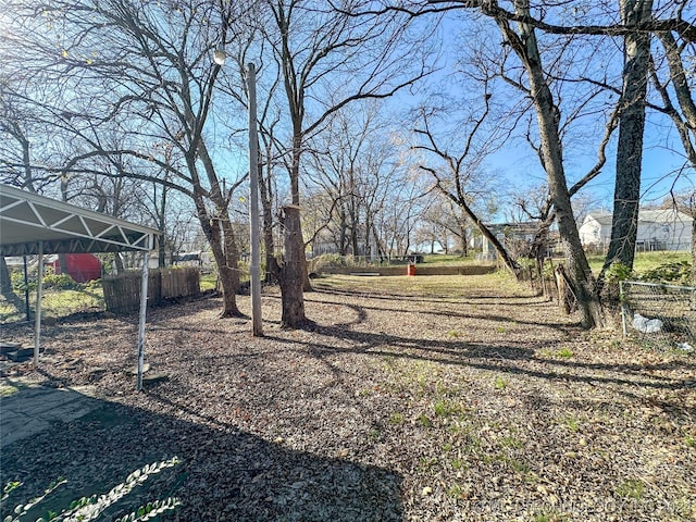 view of yard featuring a carport