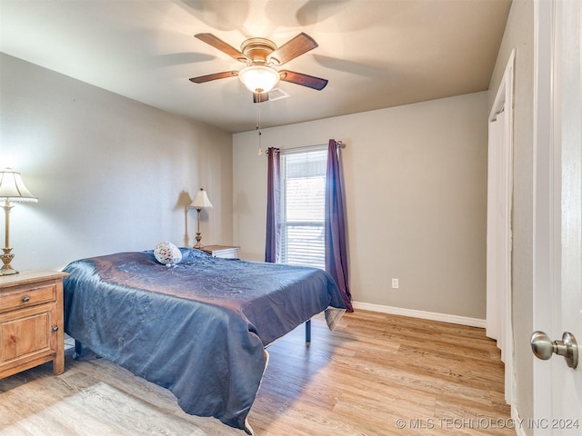 bedroom with ceiling fan, pool table, and light hardwood / wood-style flooring