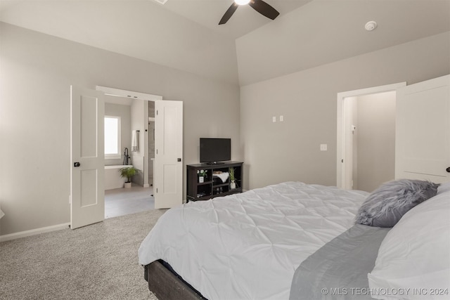 carpeted bedroom featuring ceiling fan and vaulted ceiling