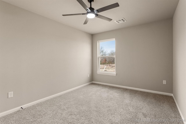 unfurnished room featuring carpet flooring and ceiling fan