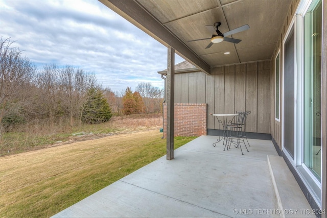 view of patio featuring ceiling fan