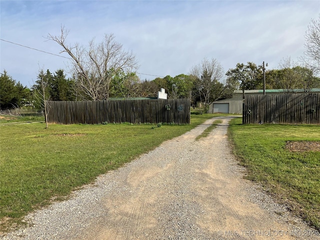 view of street featuring driveway