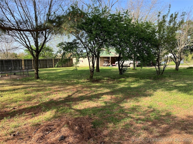 view of yard with fence