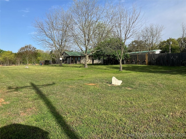 view of yard featuring fence
