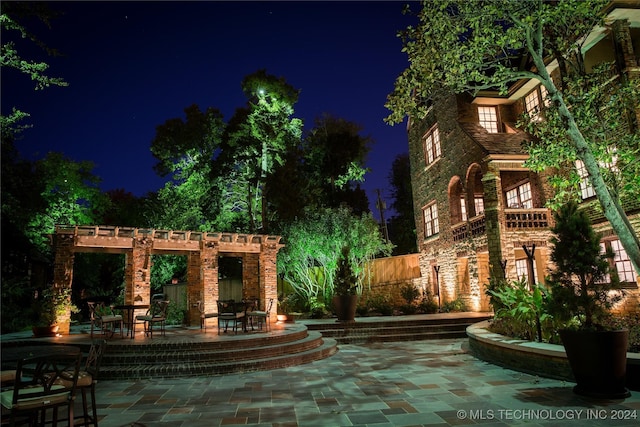 view of patio at night