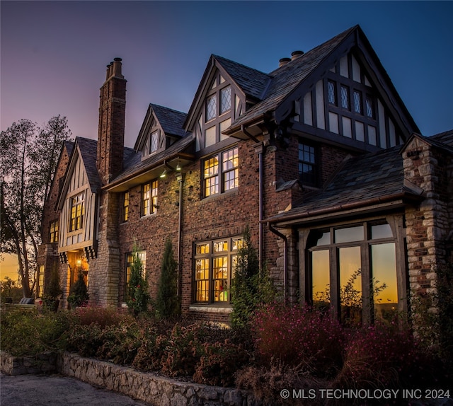 view of property exterior at dusk