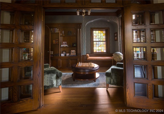 sitting room featuring hardwood / wood-style flooring