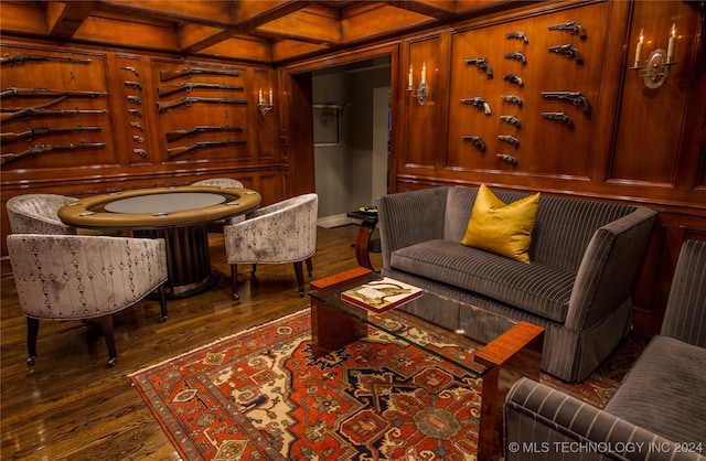 sitting room featuring beamed ceiling, dark hardwood / wood-style flooring, and coffered ceiling