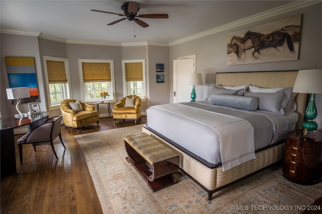 bedroom with dark hardwood / wood-style flooring, ceiling fan, and ornamental molding