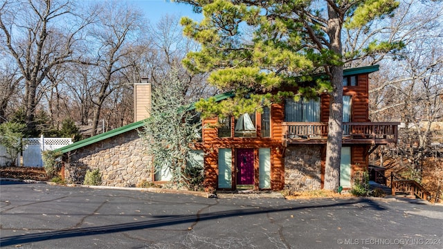 view of front of home with a deck