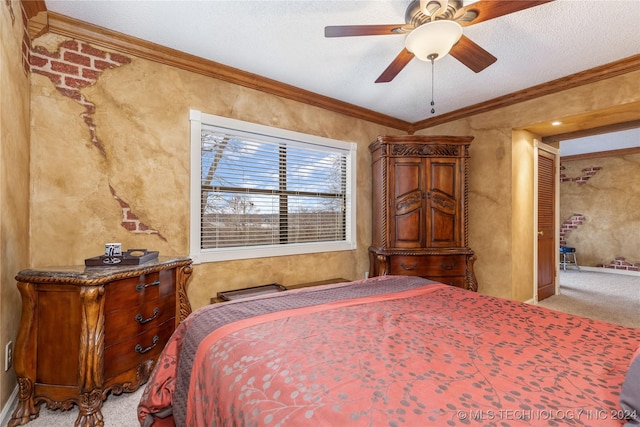 bedroom featuring carpet, ceiling fan, and ornamental molding