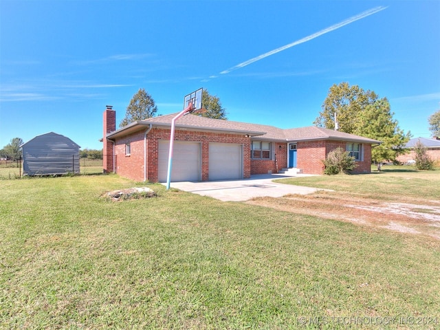 ranch-style home with a garage and a front lawn