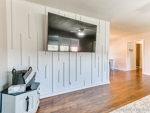 room details featuring ceiling fan and hardwood / wood-style flooring