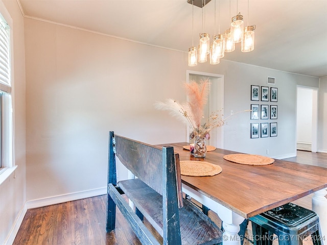 dining area with dark wood-type flooring