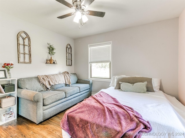 bedroom featuring ceiling fan and hardwood / wood-style floors