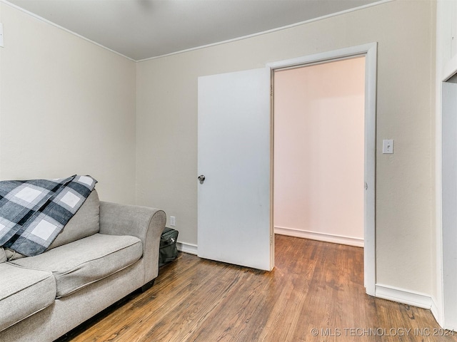 living area featuring hardwood / wood-style floors