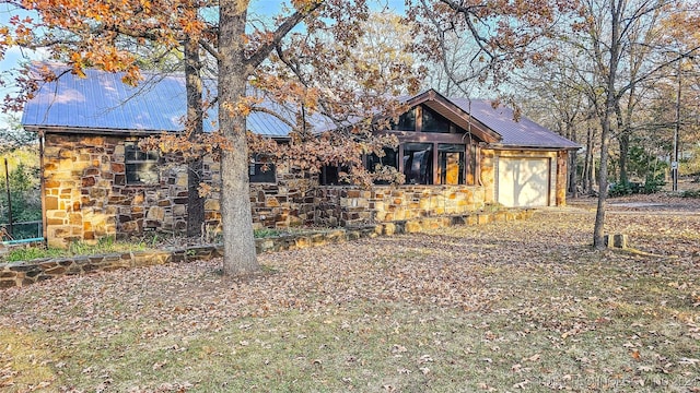 view of front of property with a garage