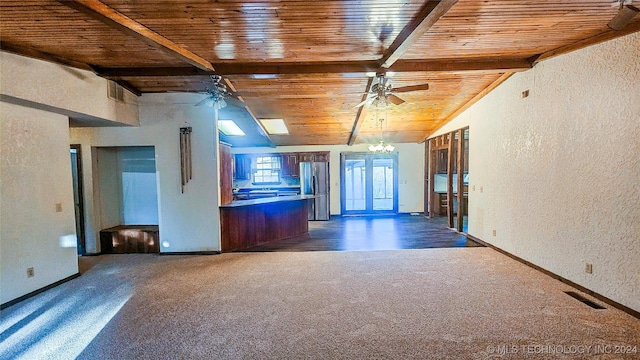 unfurnished room featuring dark carpet, wood ceiling, lofted ceiling with beams, and ceiling fan