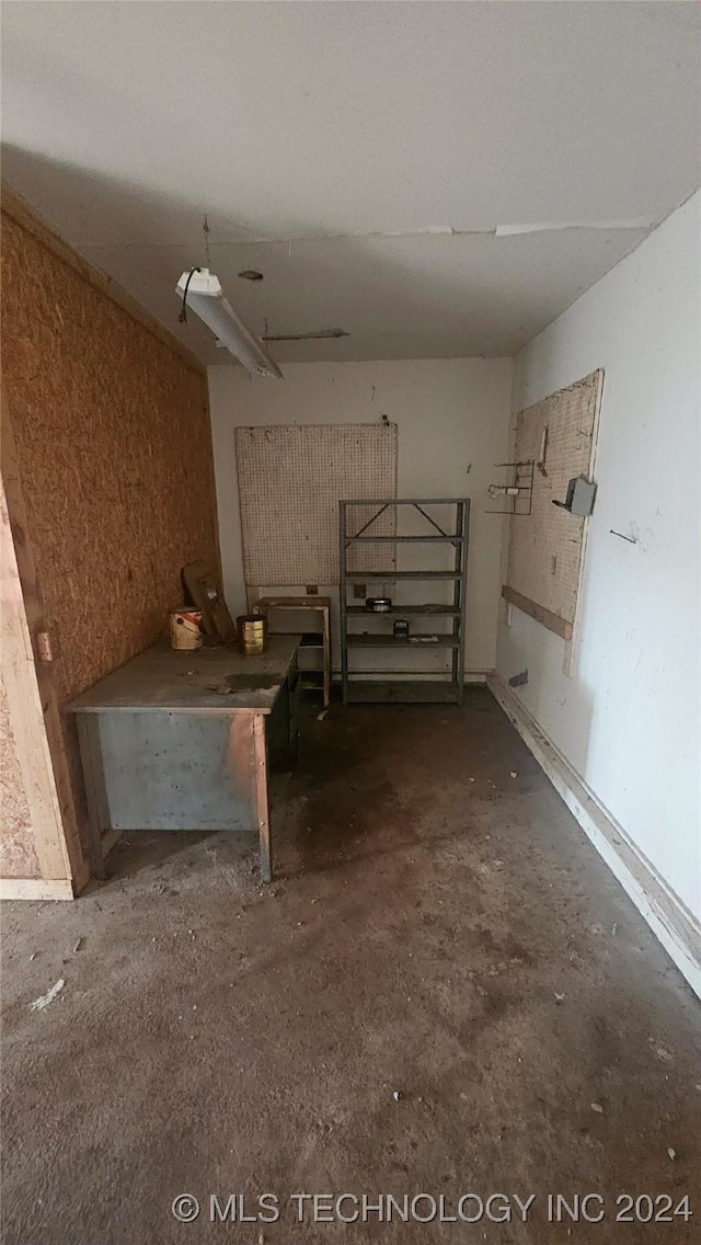 basement with a workshop area