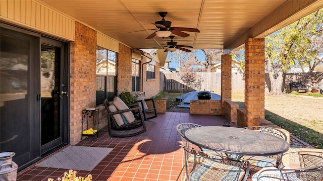 view of patio with ceiling fan