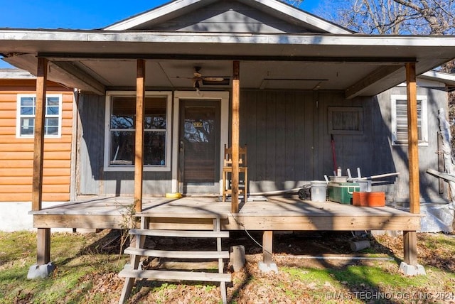 doorway to property featuring covered porch