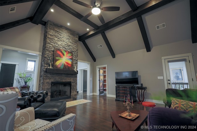 living room with beam ceiling, ceiling fan, dark hardwood / wood-style flooring, high vaulted ceiling, and a fireplace