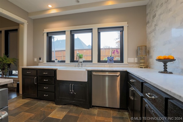 kitchen featuring dishwasher and sink