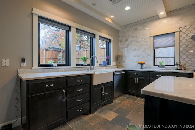 kitchen featuring dishwasher and sink