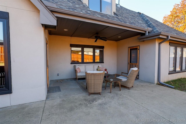 view of patio featuring outdoor lounge area and ceiling fan