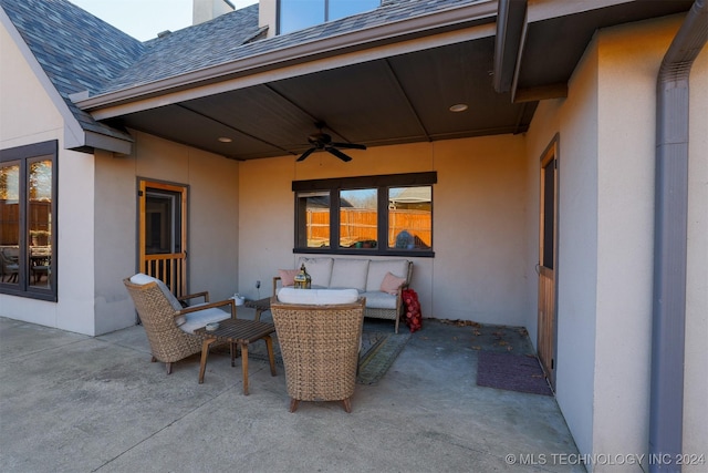 view of patio featuring outdoor lounge area and ceiling fan