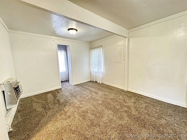 carpeted empty room with a wall mounted AC and heating unit