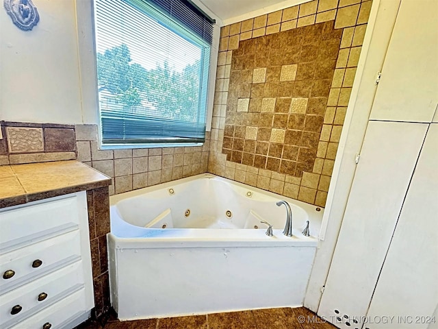 bathroom with a bathtub and tile walls