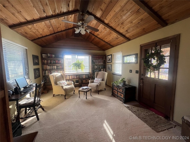 sitting room with a healthy amount of sunlight, light colored carpet, and wood ceiling