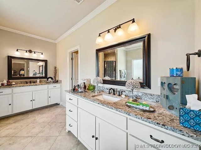 bathroom with tile patterned flooring, vanity, and ornamental molding