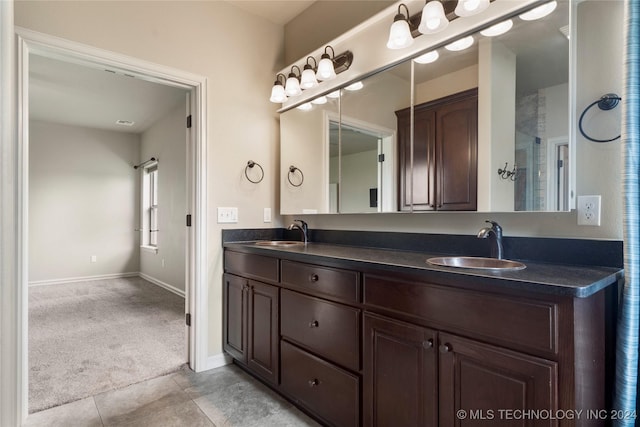 bathroom featuring vanity and tile patterned floors