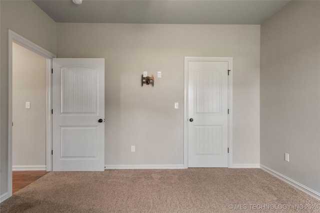 unfurnished room with carpet