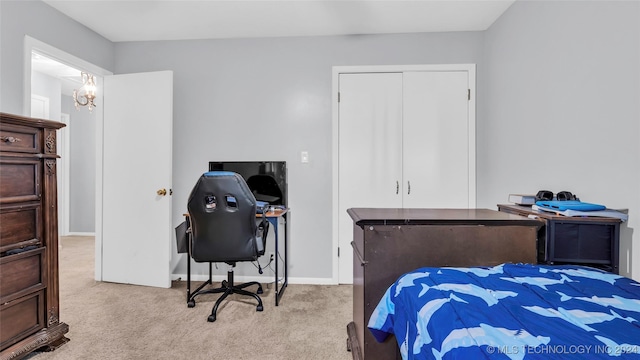 bedroom featuring light carpet and a closet