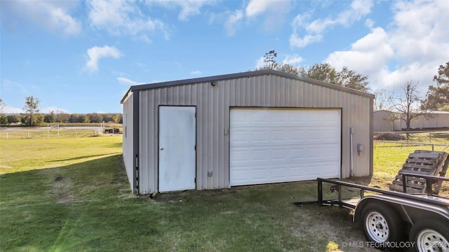 garage with a lawn