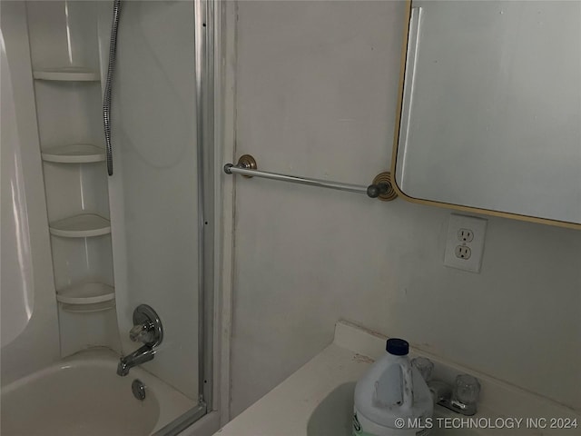 bathroom with shower / washtub combination