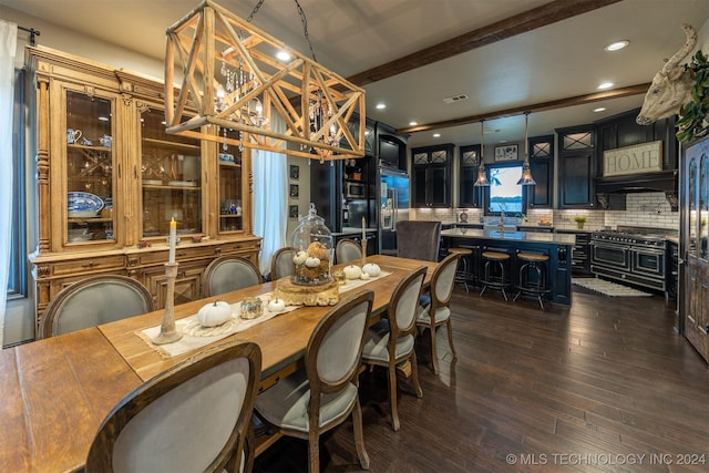 dining area featuring dark hardwood / wood-style floors