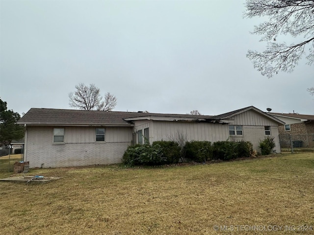 view of property exterior featuring a yard