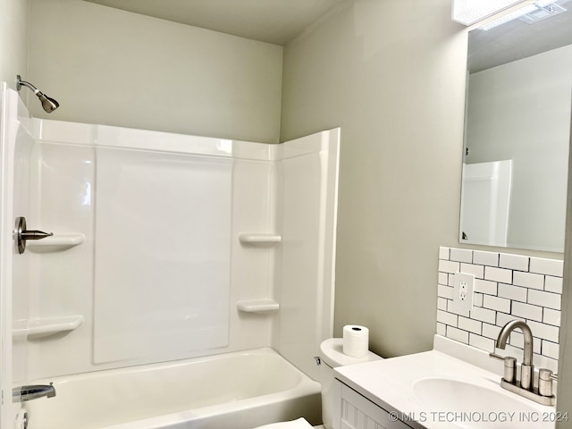 full bathroom with vanity, shower / tub combination, backsplash, and toilet